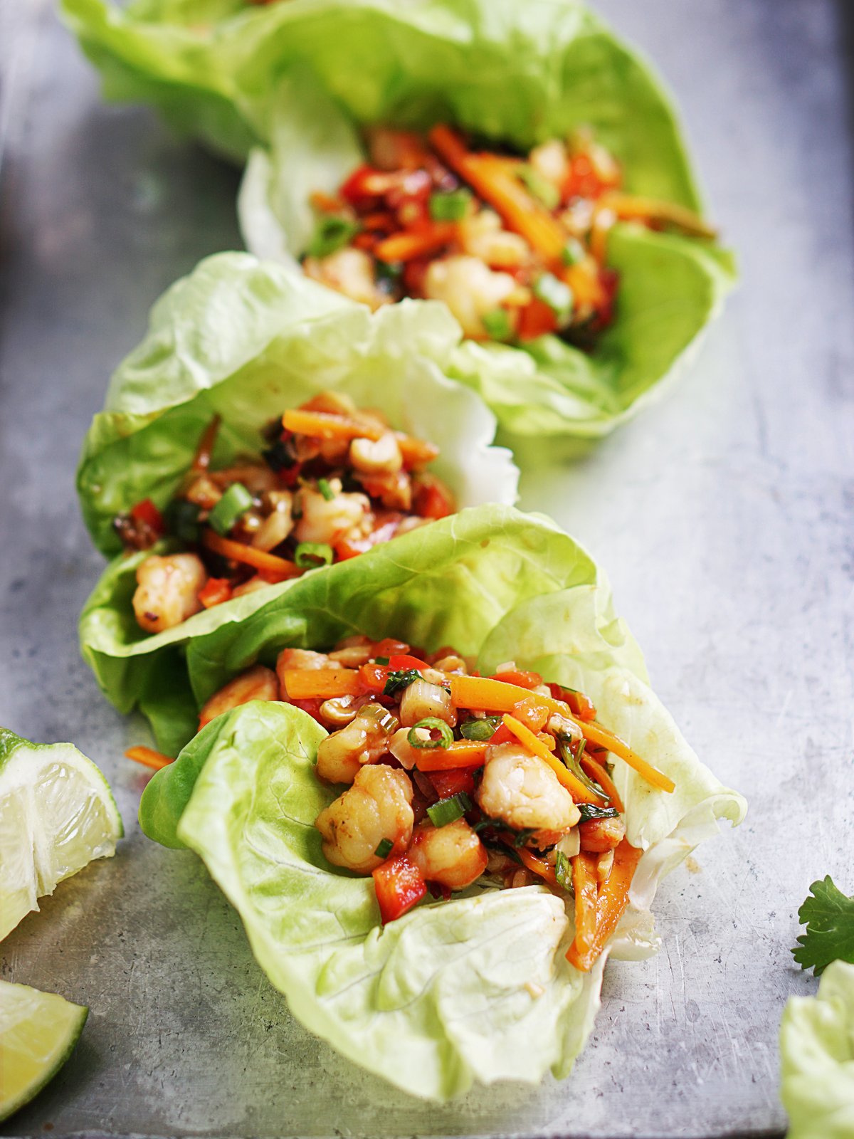 Lettuce wraps filled with Asian shrimp and vegetables