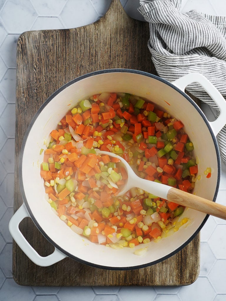 Stirring vegetables in the pot