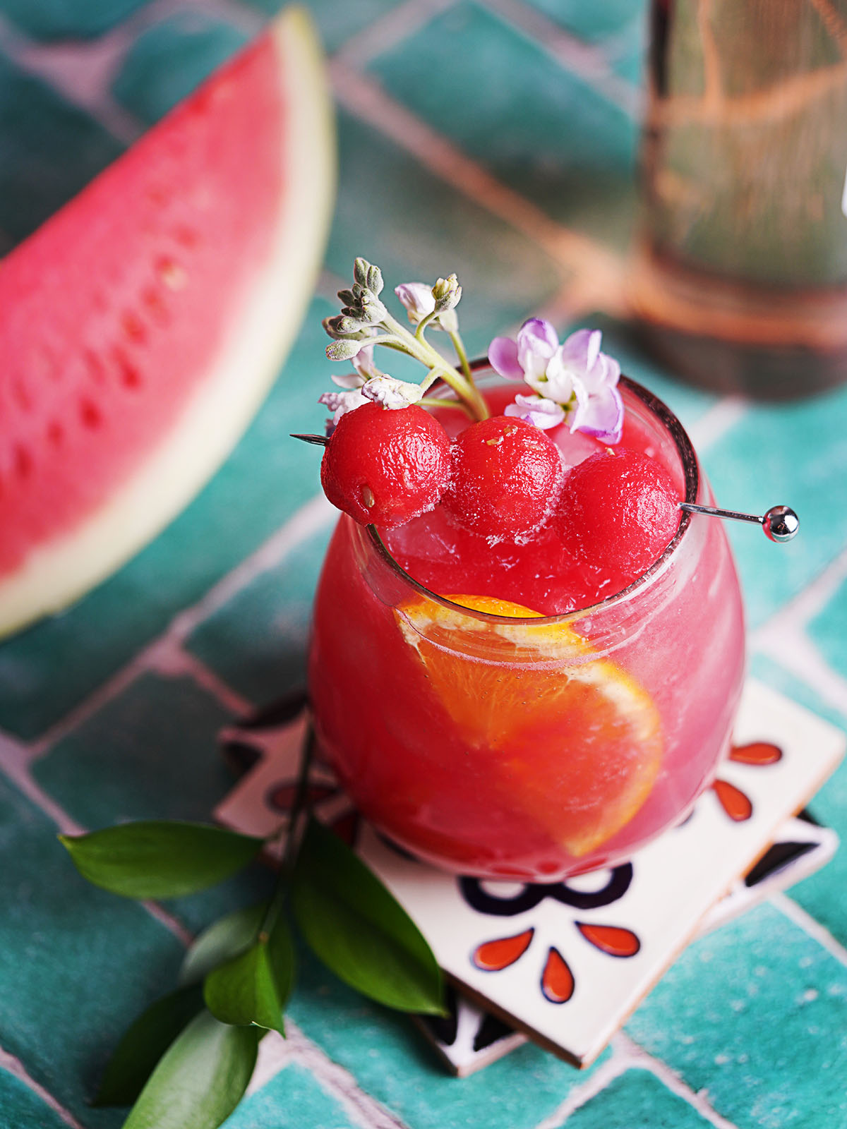 Watermelon sangria in a glass garnished with watermelon balls