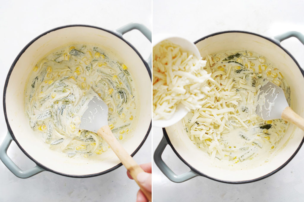 Cooking rajas con crema in a medium sauce pan being mixed with a spatula.