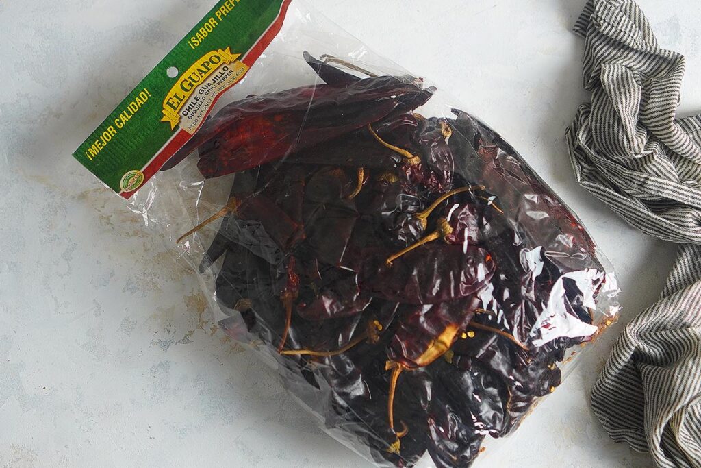 A bag of guajillo peppers from the grocery store.