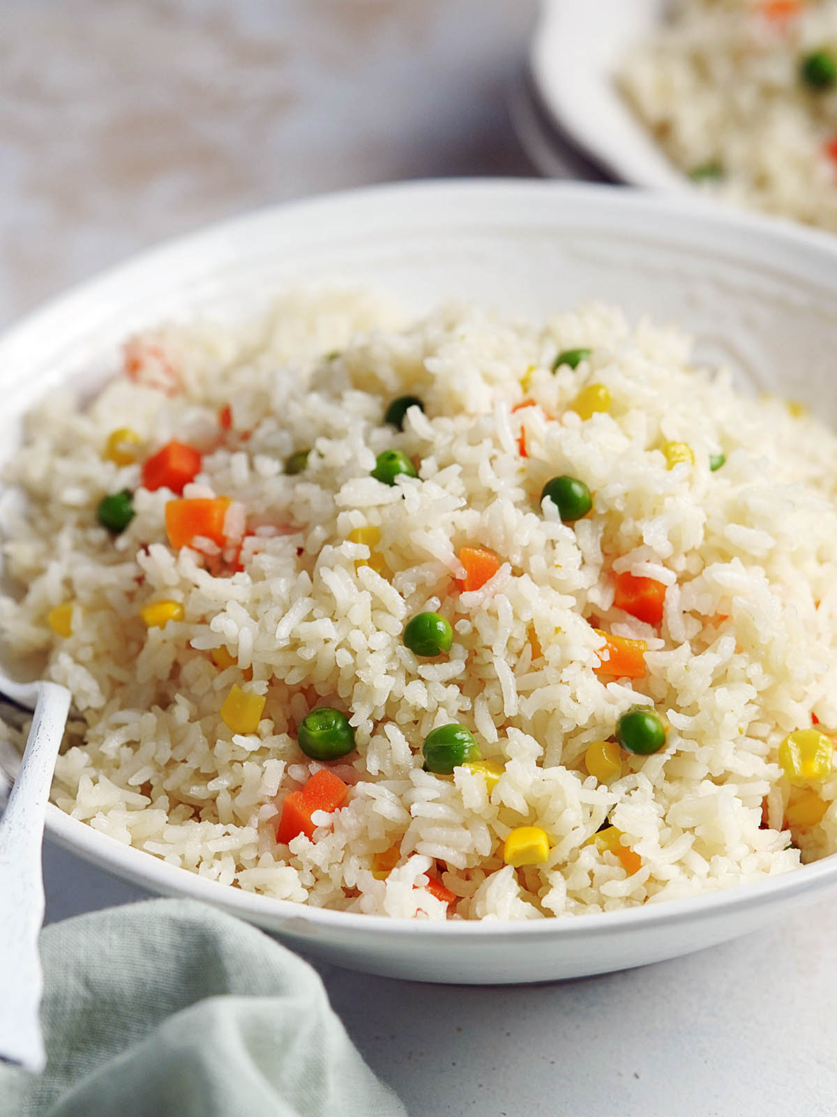 A white bowl with white mexican rice.