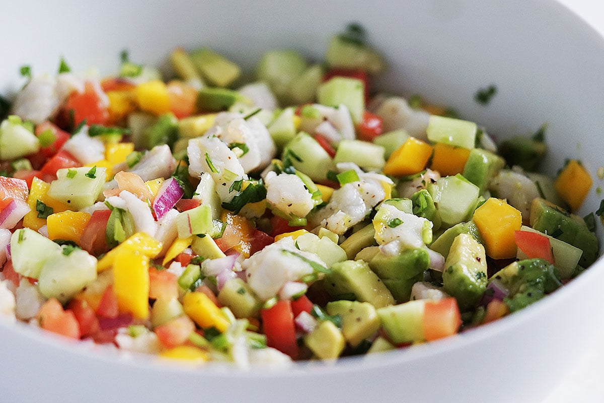 A white bowl with ceviche.