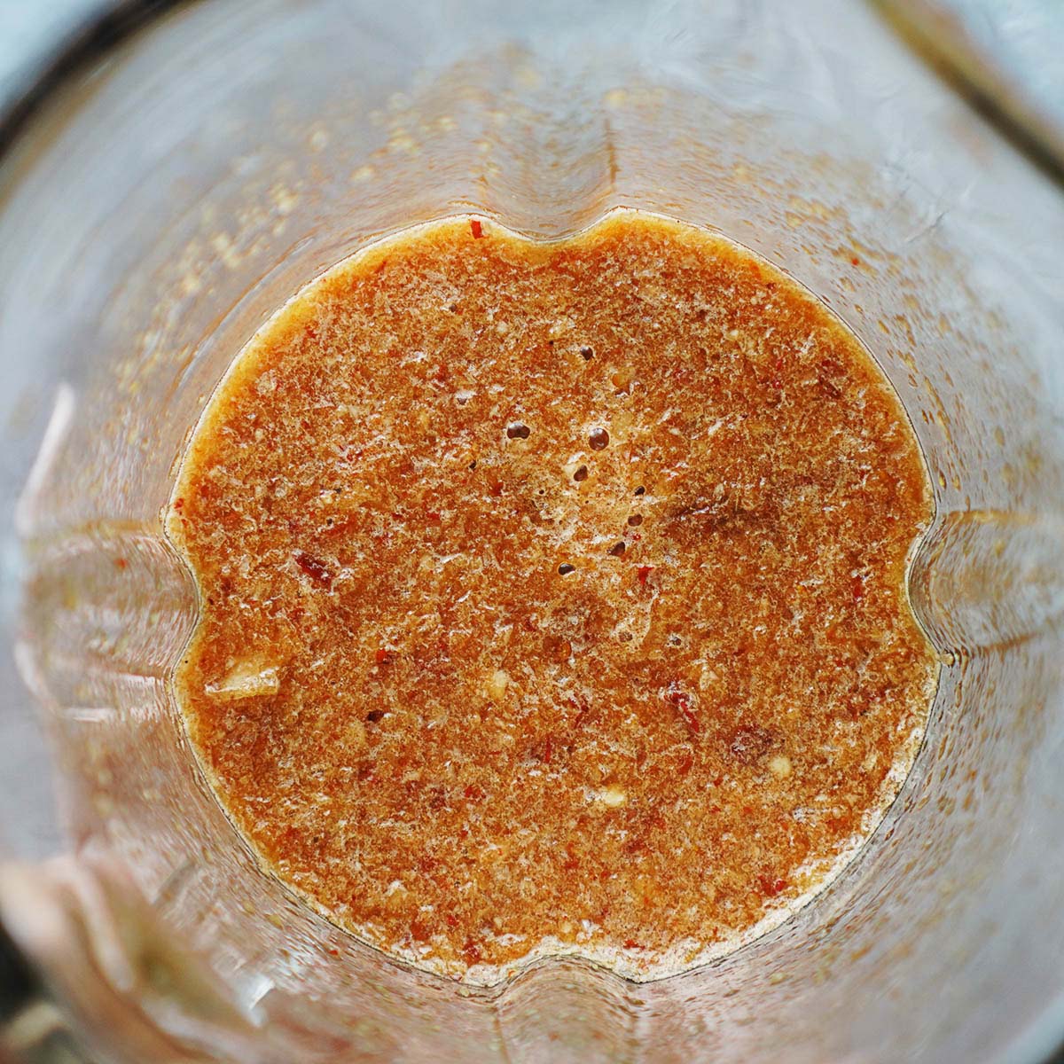 A blender with the chipotle marinade.