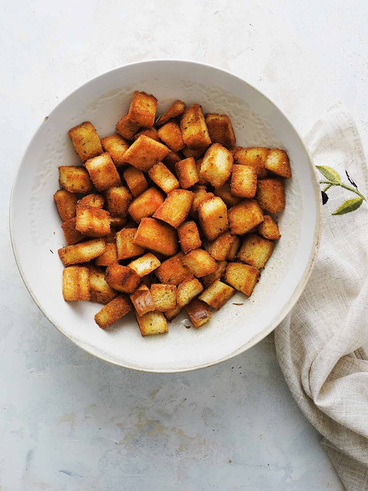 Cubed croutons in a bowl.