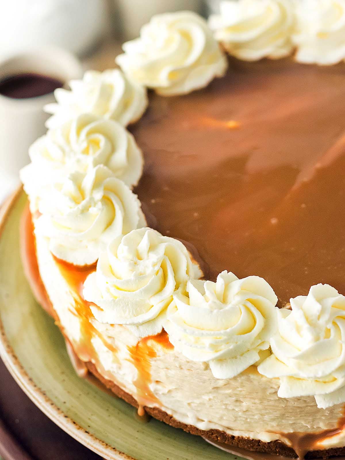 The dulce de leche cheesecake placed on a plate.